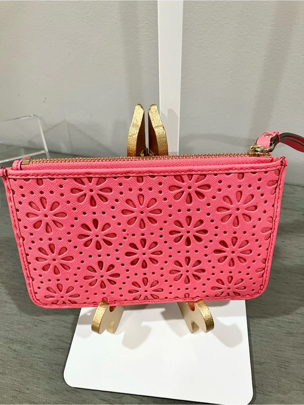 Kate Spade laser-cut floral wristlet clutch in pink